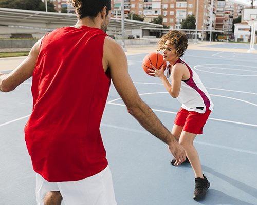 front-view-friends-playing-basketball